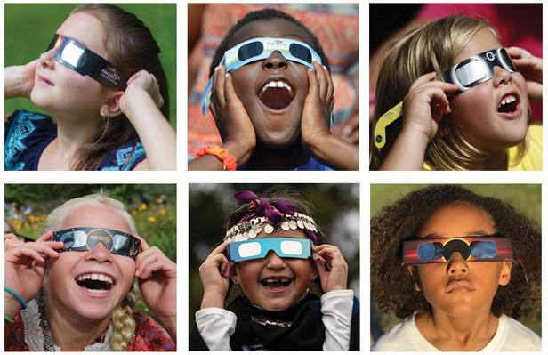 kids wearing eclipse glasses