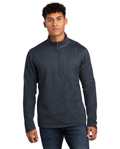 man wearing quarter zip pullover