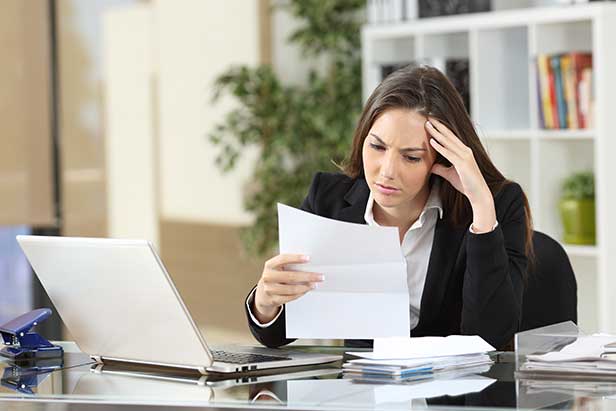 Frustrated Woman in Front of Computer