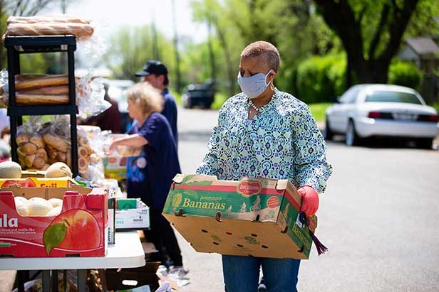 Woman Helping with Food Donations