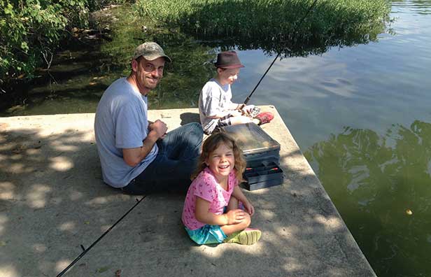 Enjoying a leisurely afternoon with his niece and nephew