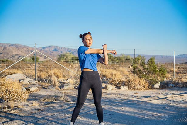 Young woman stretching