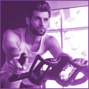 Man doing indoor cycling workout