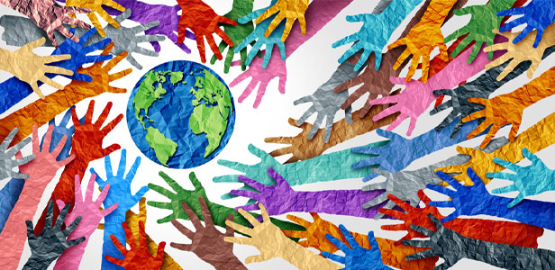 colorful paper hands toward earth