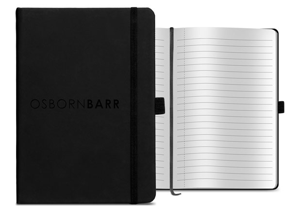 Black journal open with lined paper