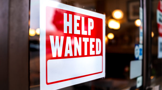 Help wanted sign in window