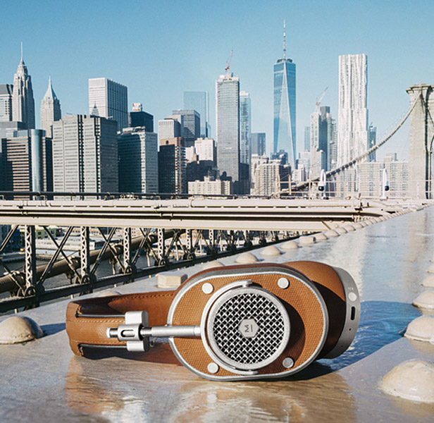 bluetooth headphones with NYC skyline in background