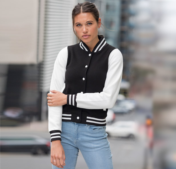 woman wearing black & white varsity jacket