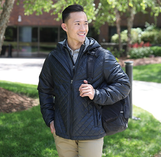 man wearing blue parka