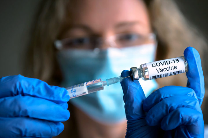 Biden Orders COVID Vaccine Mandates for Larger Employers