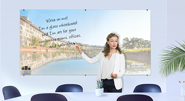 woman writing on magnetic glass whiteboard