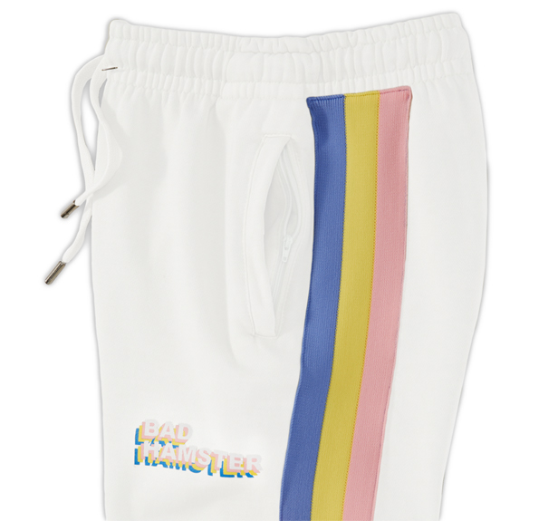 white sweatpants with blue, yellow and pink strip down side