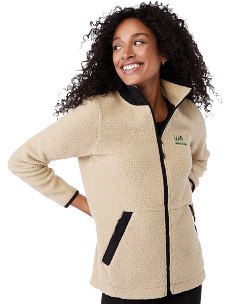 woman wearing buff color zip fleece