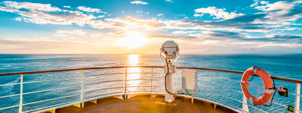 cruise ship from view of bow at sunrise