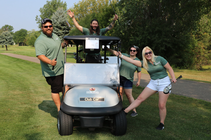 Crystal-D employees golfing