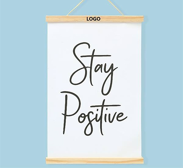 wood magnetic poster frame hanger with poster that reads Stay Positive