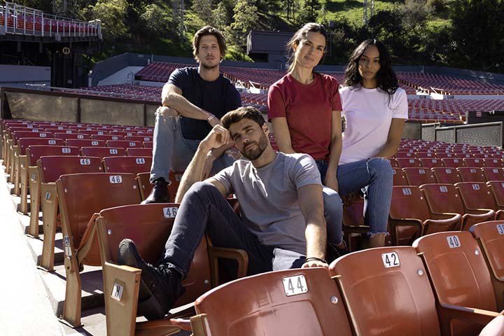 Group of young people sitting outside