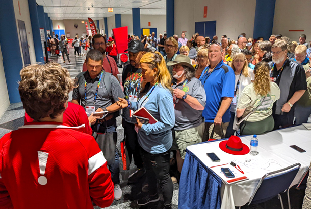 Distributor attendees line up for the New Product Preview Reception