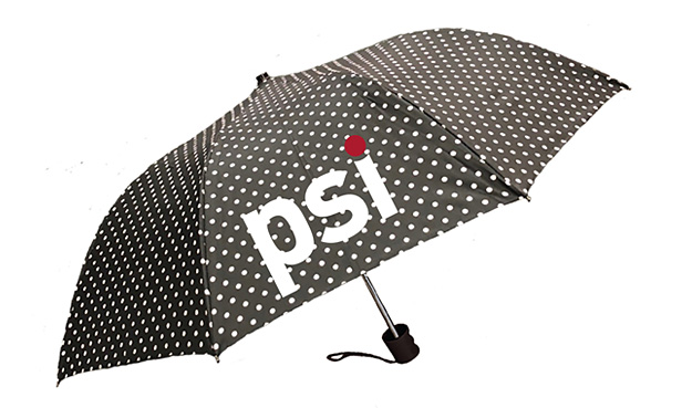 black umbrella with white polka dots