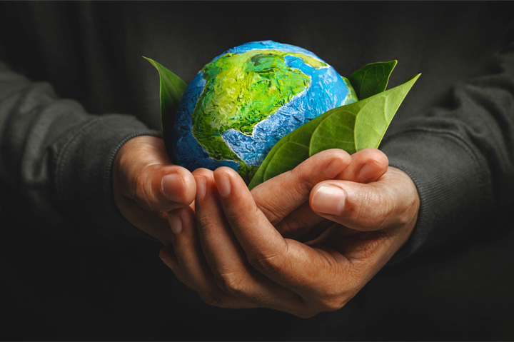 earth day concept, globe in hands