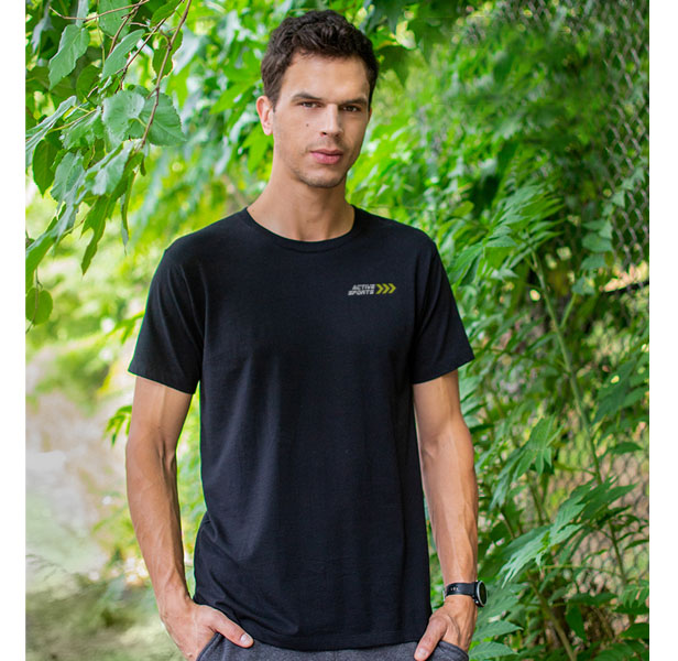 man wearing black t-shirt, trees behind