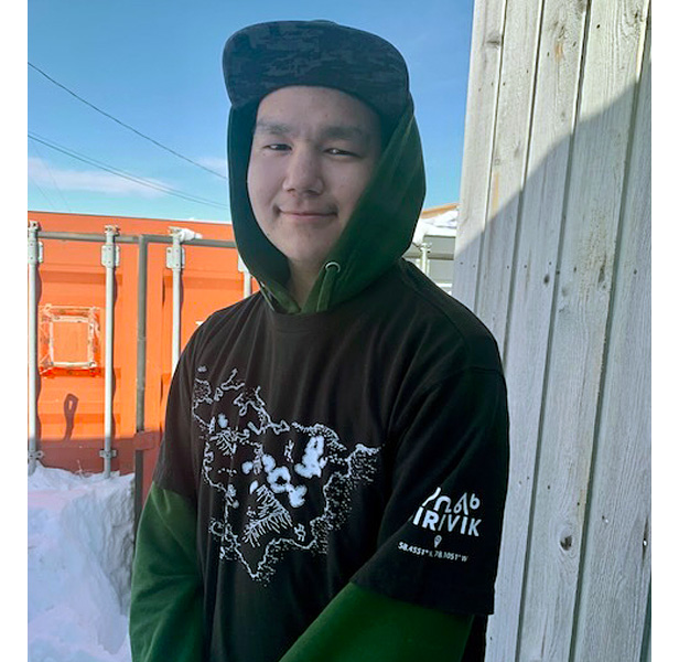 young man wearing hoodie and cap