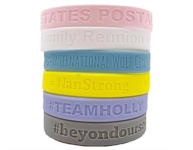 stack of pastel-colored silicone bracelets