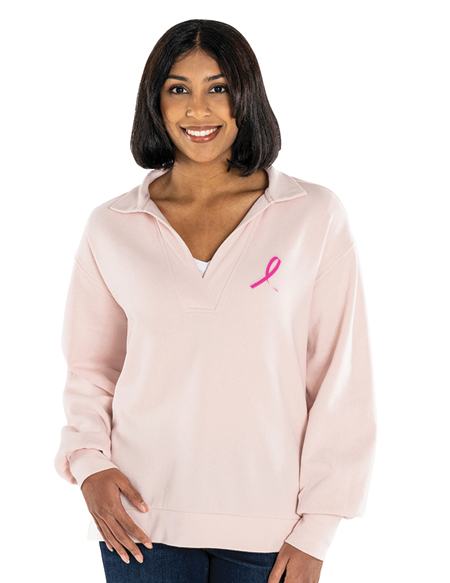 woman wearing light pink sweatshirt