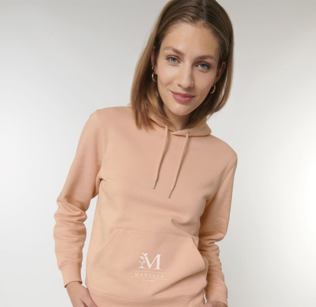 woman wearing peach hoodie