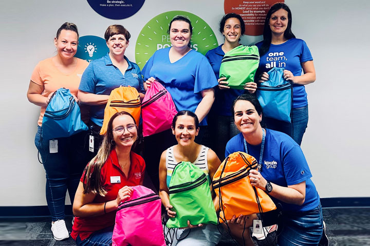 The Bright Side: Koozie Group Assembles 1,900 Backpacks of School Supplies for Charity