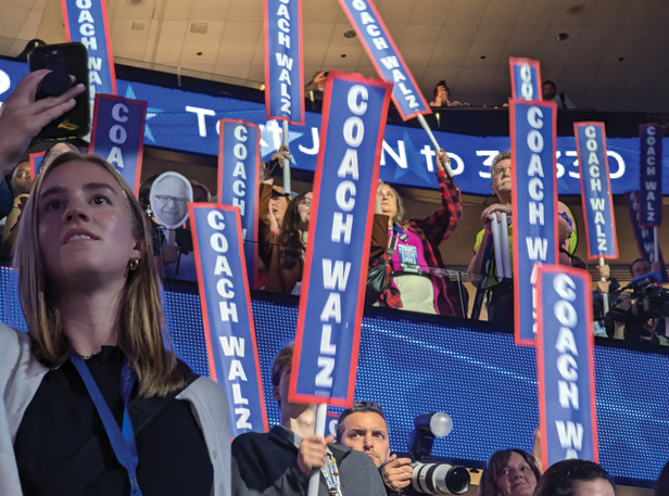 DNC attendees waving signs