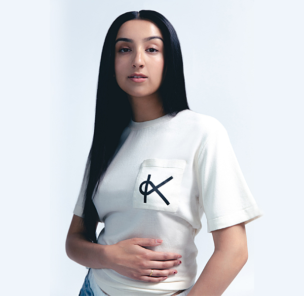 woman wearing white t-shirt made from recycled seaweed