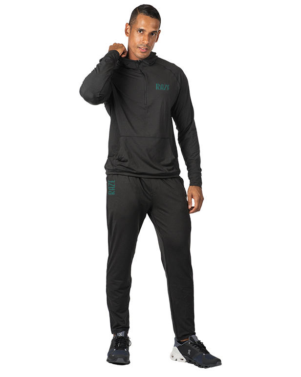 male model wearing black track suit