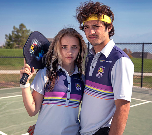 girl and guy on pickle ball court