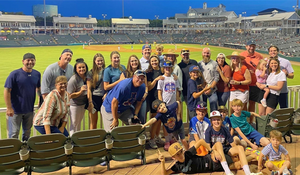 INM employees at baseball game