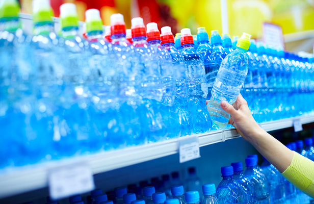 plastic water bottles on store shelf
