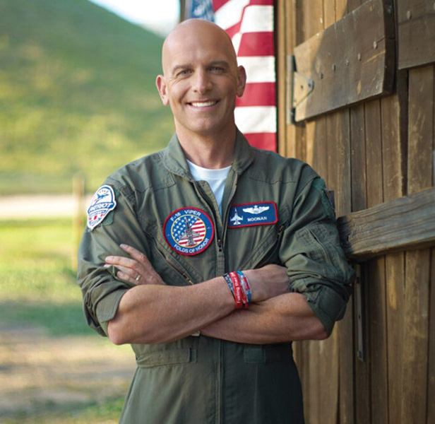 Lt. Col. Dan Rooney standing with arms folded